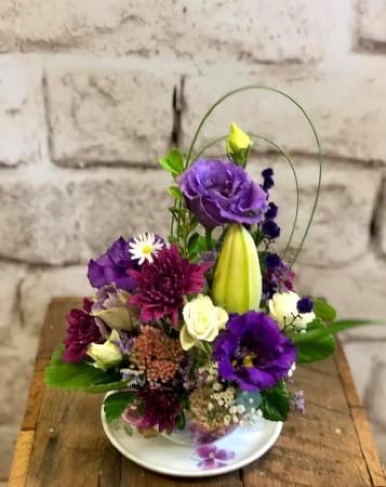 Large teacup flower arrangement