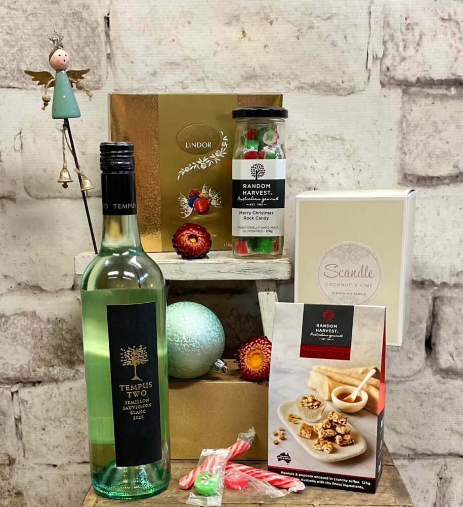 Hamper of Christmas Gifts | Candle, rock candy, chocolate, popcorn, bath salts, wine, christmas ornaments