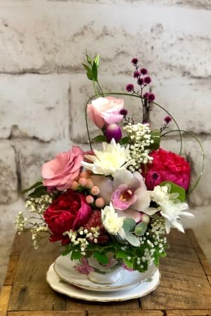 Pink teacup flower arrangement double