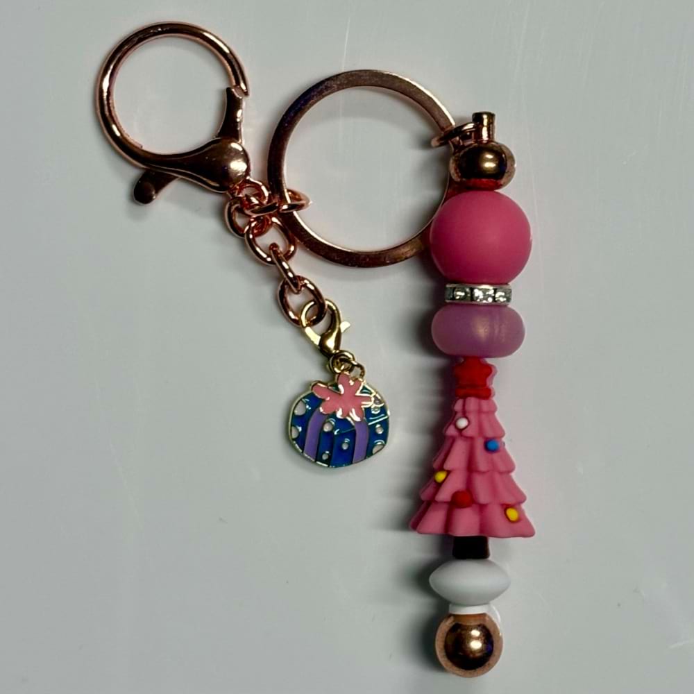 Pink Christmas Tree beaded keyring with silicone, clay and wooden beads on a threaded post, handmade by a Newcastle designer.