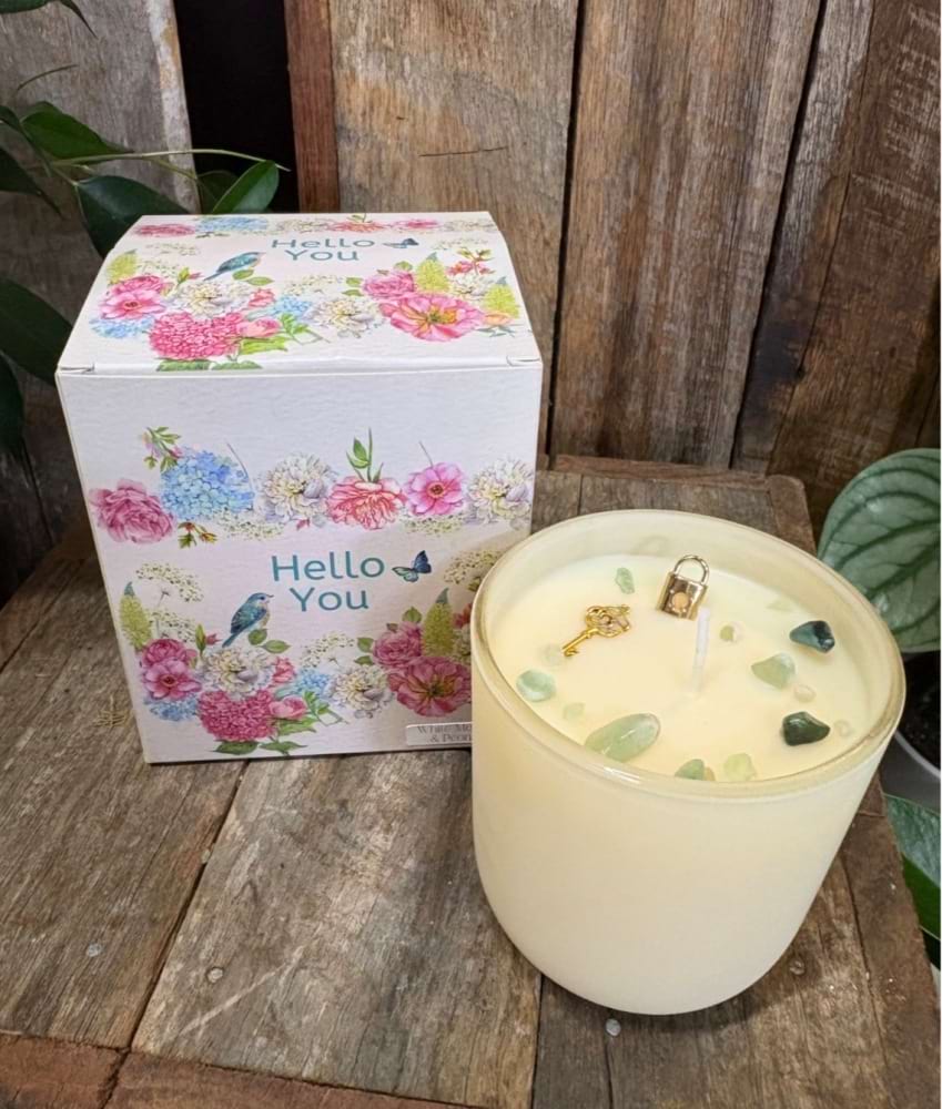 Hand-poured White Melon and Peony soy candle in a glass jar with crystals and charm