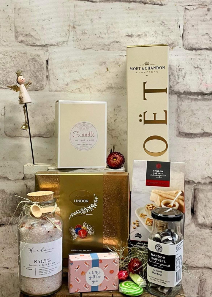 Hamper of Christmas Gifts | Candle, rock candy, chocolate, moet, popcorn, bath salts, christmas ornaments