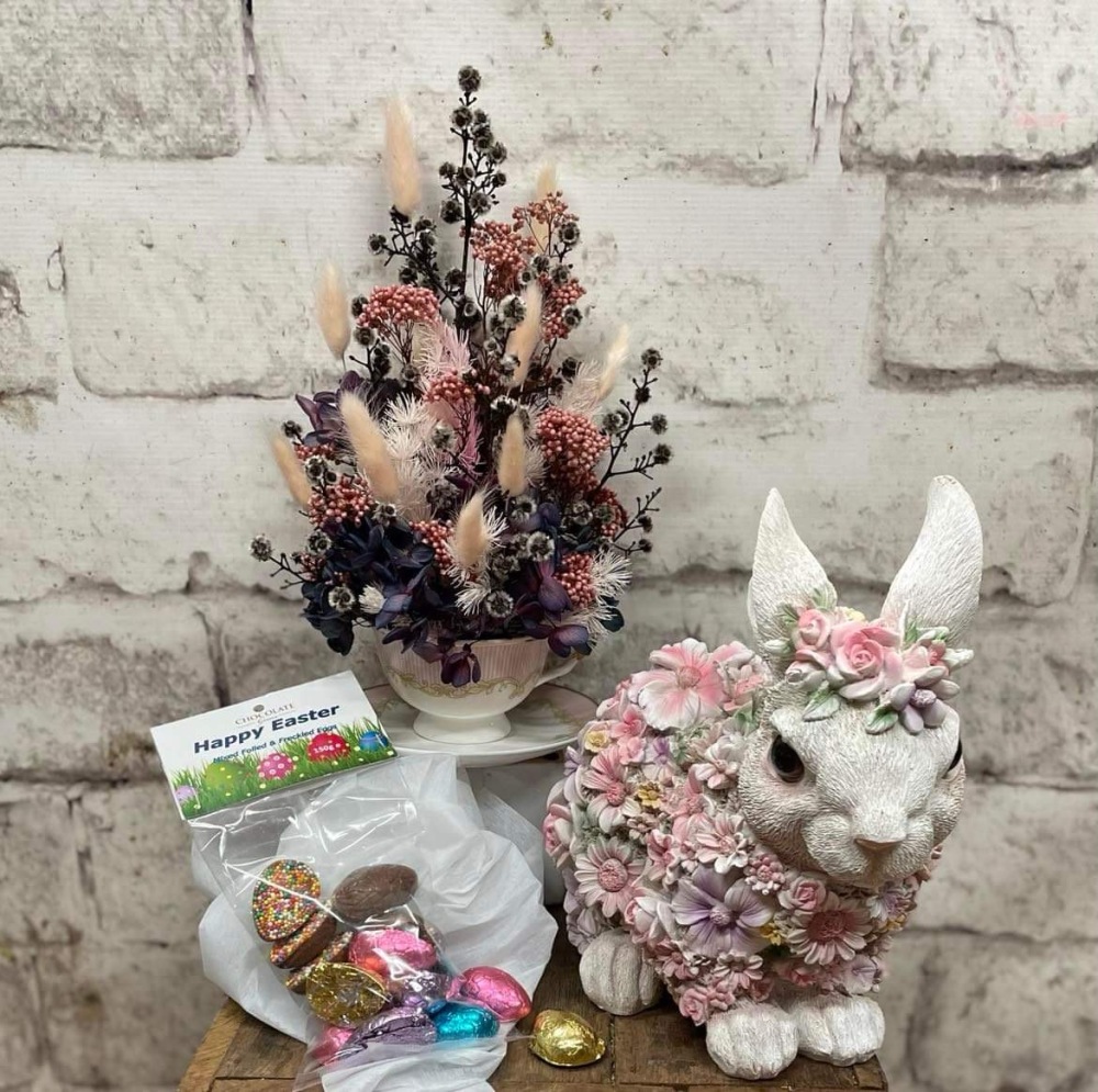 Preserved flower arrangement in a teacup, medium ceramic bunny, easter eggs